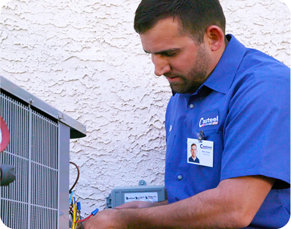 Technician working on an HVAC unit.