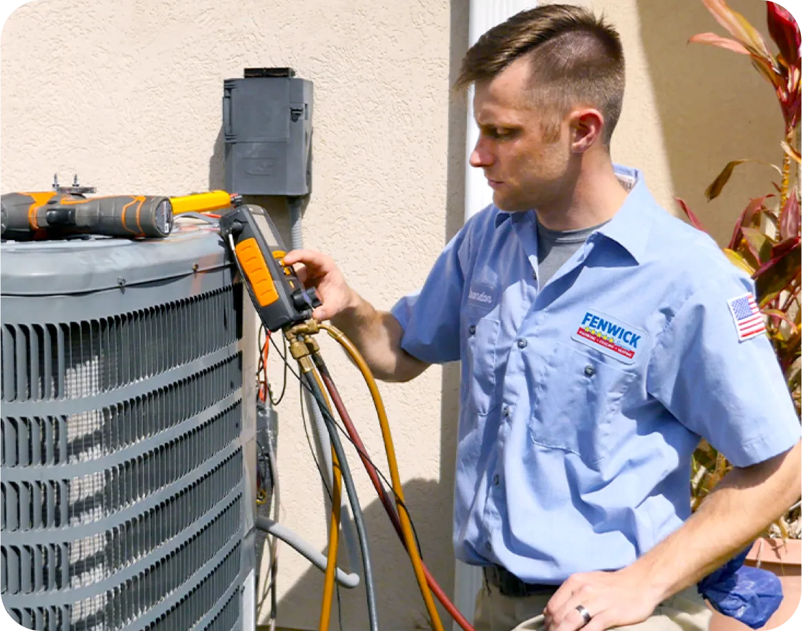 Technician working on an HVAC unit.