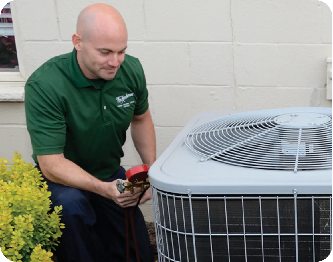 Technician working on an HVAC unit.