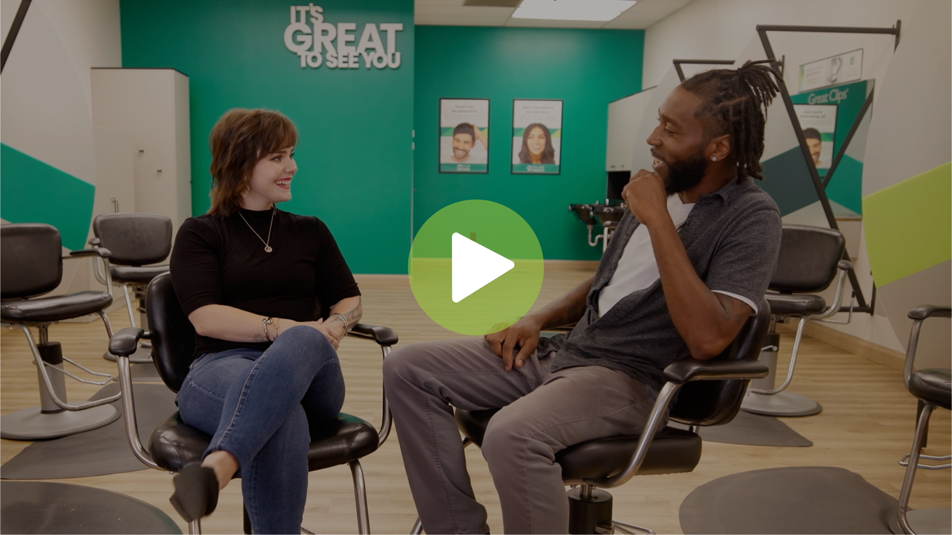 Play Video: two stylists in a Great Clips salon sit in salon chairs as they have a conversation