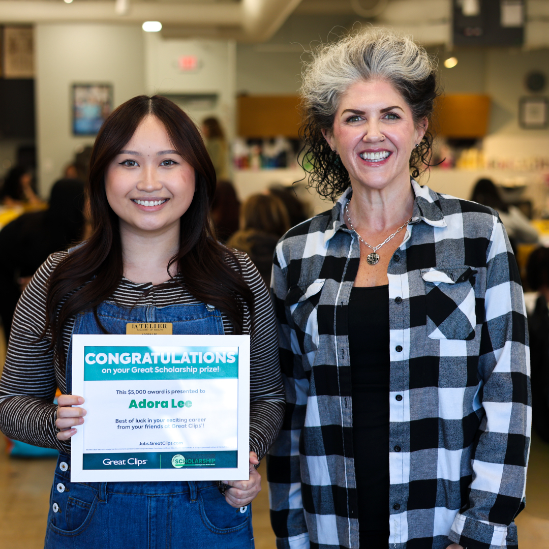 Scholarship recipient Adora stands with local franchisee, Jennifer Finkelstein.