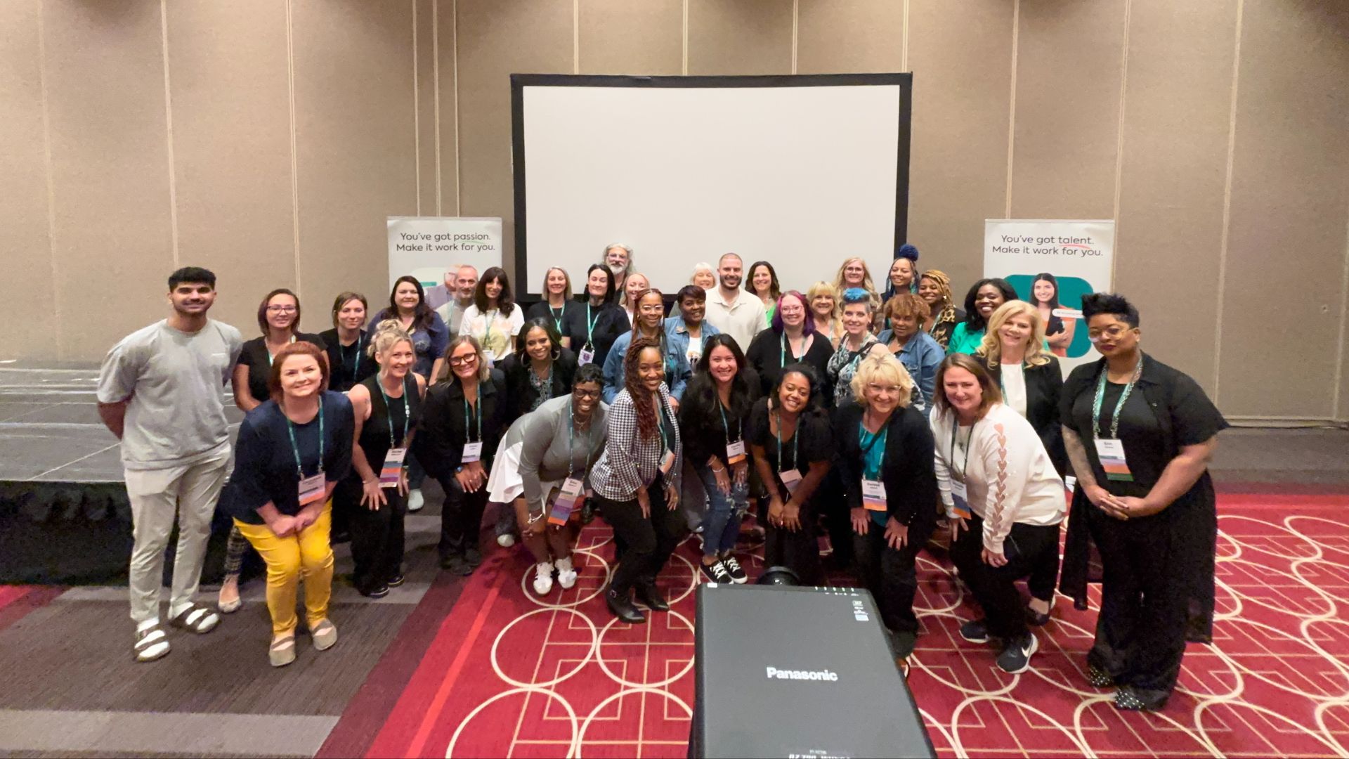 Group of smiling cosmetology and barbering educators.