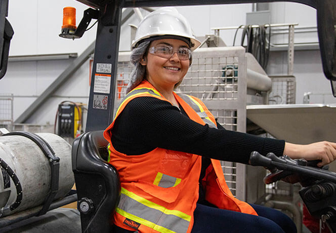 Image of woman operating machine