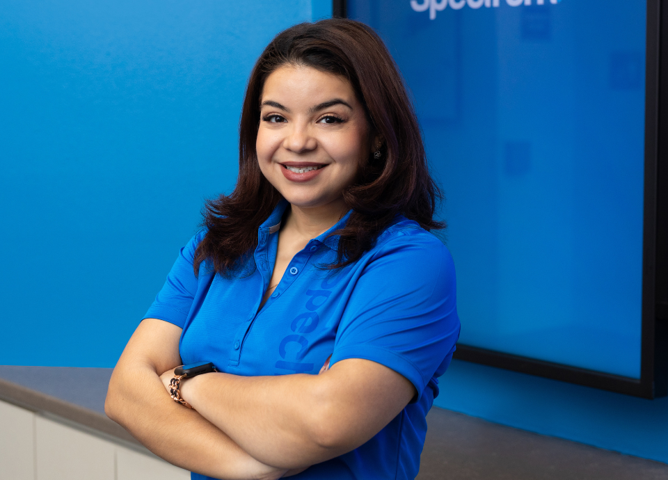 spectrum employee smiling at work