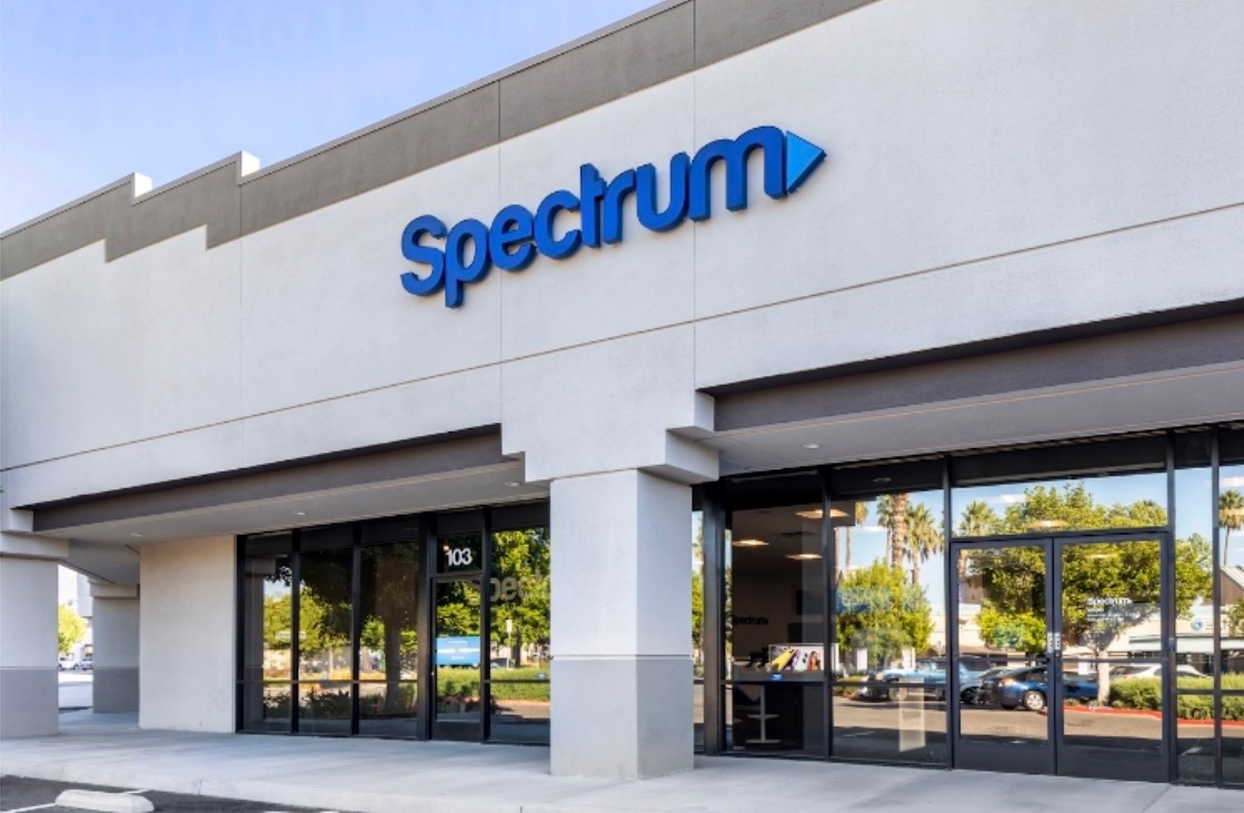 exterior of Matthew's store featuring Spectrum logo on building