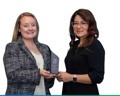 spectrum University Relations team megan and elly smiling with nspa scholarship award