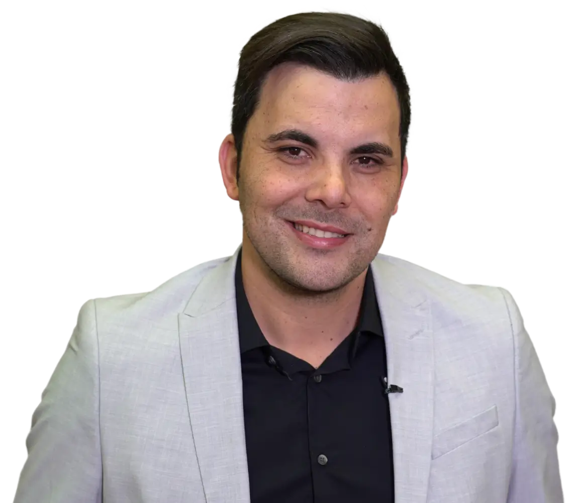 headshot of employee javier smiling