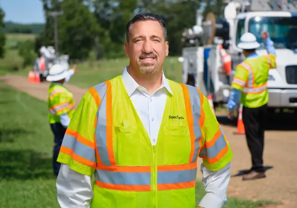 spectrum field technician employee smiling on the job