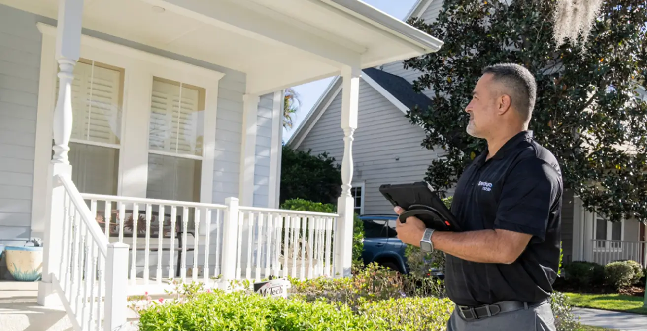outside sales representative walking neighborhood to sell spectrum products