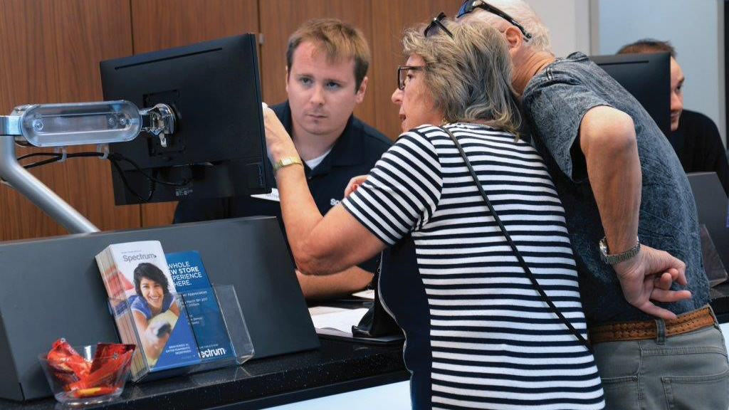 Man helping customers