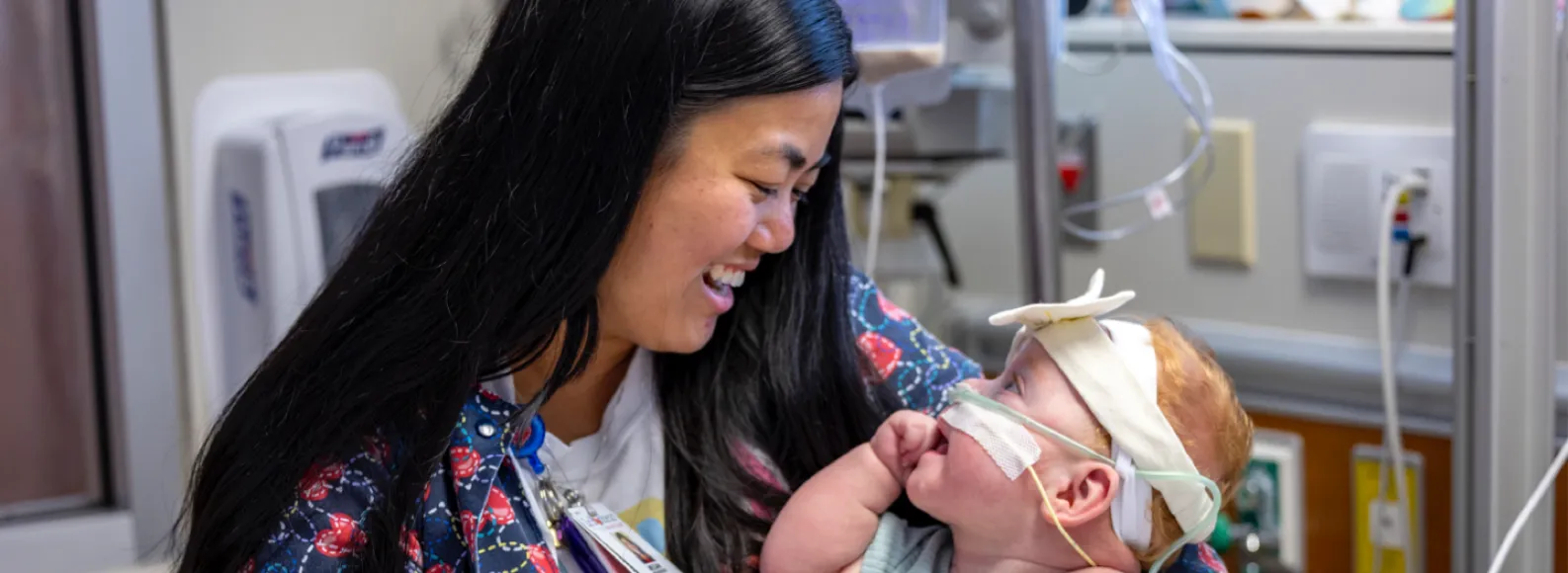 A PICU nurse caring for a toddler