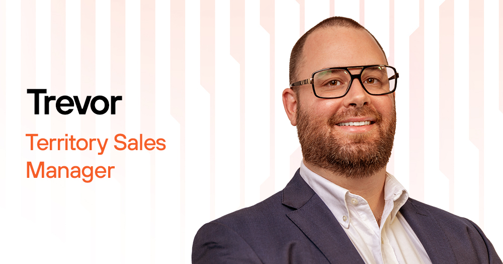 Trevor, Territory Sales Manager at Palo Alto Networks, smiling in a professional setting, representing his four-year career journey from BDR to sales excellence.