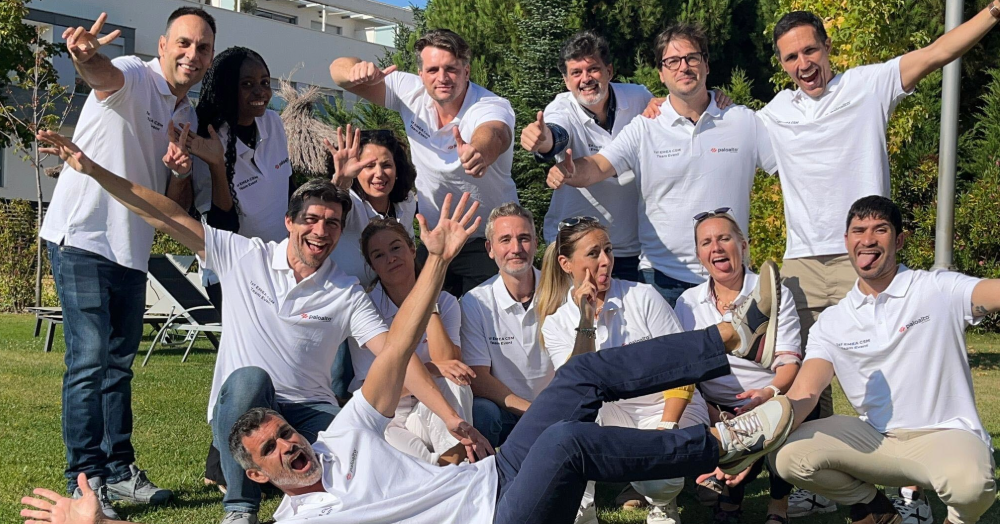 Sergio and EMEA team members pose outside for a fun team photo.