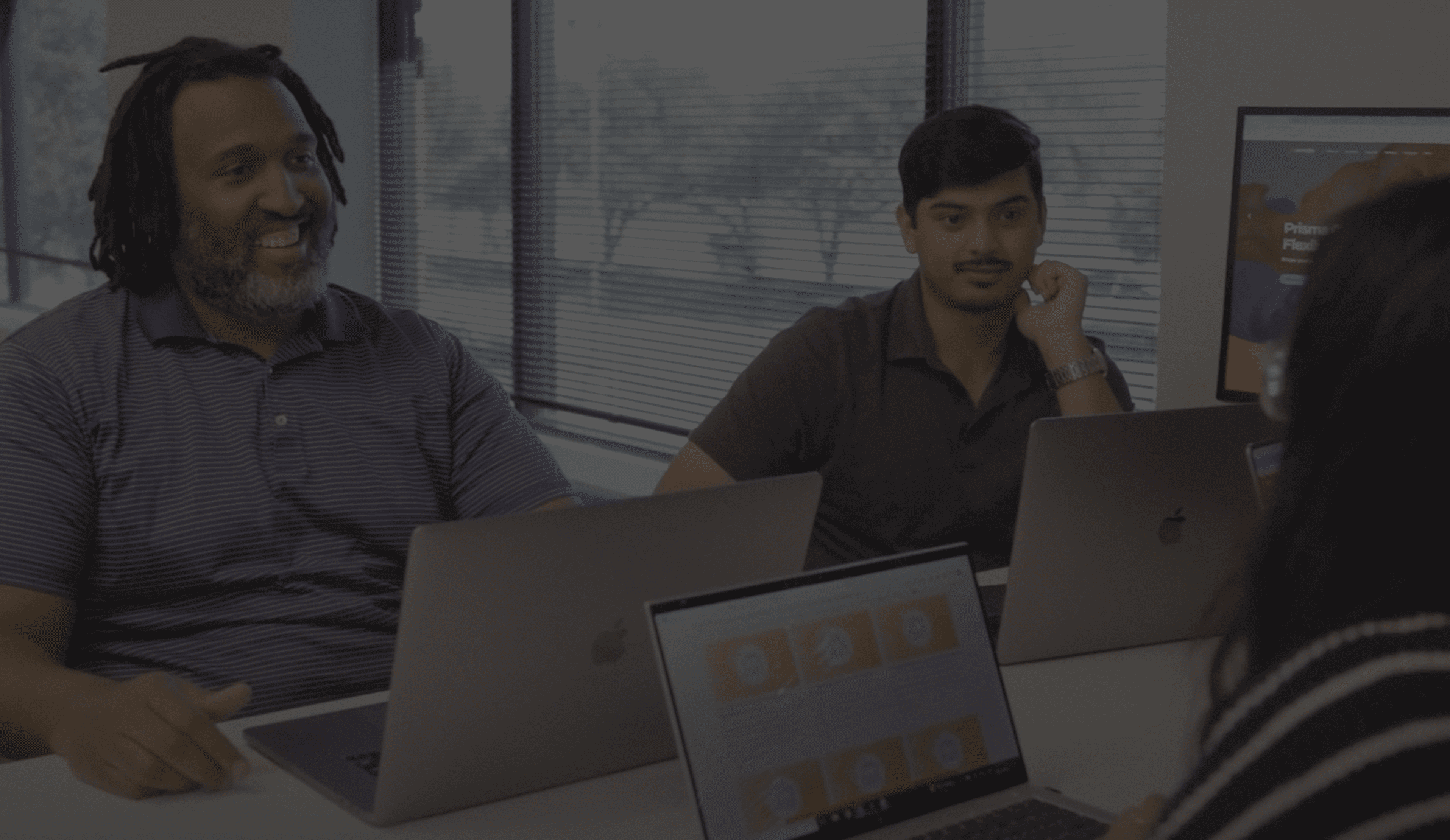 Two men brainstorming in a board room.