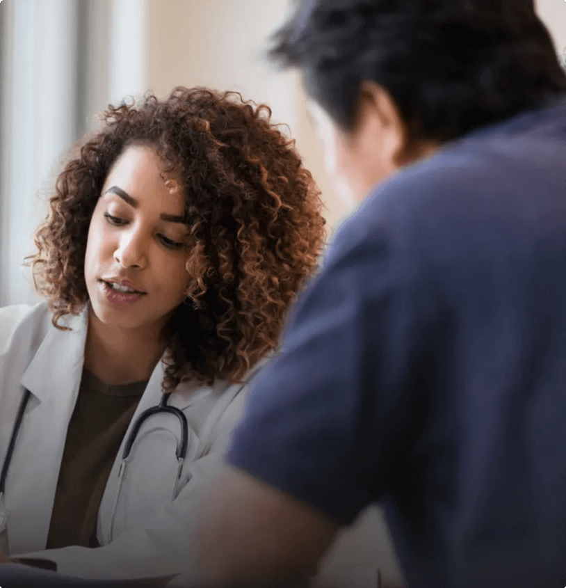 A doctor and patient going over the patients results