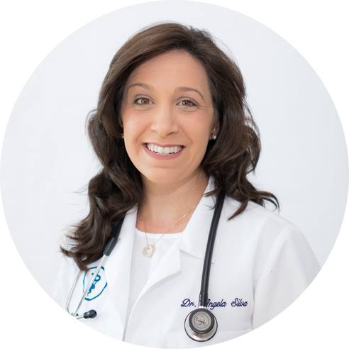 Dr Angela Silva in lab coat with stethoscope.