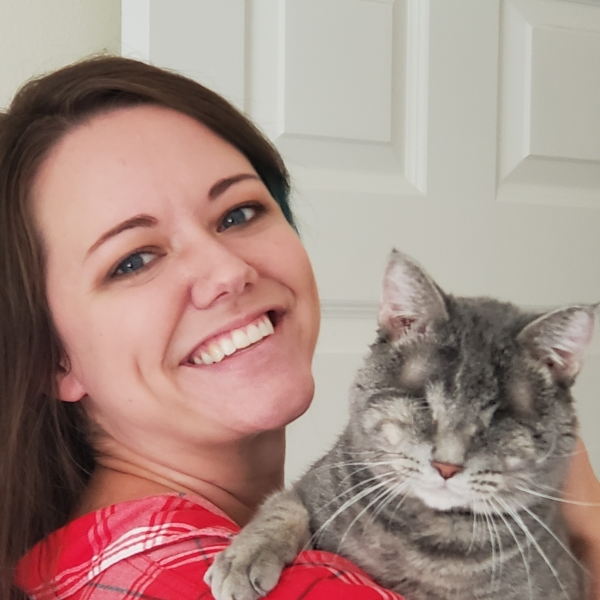 woman holding a cat