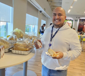 Person serving food at indoor event