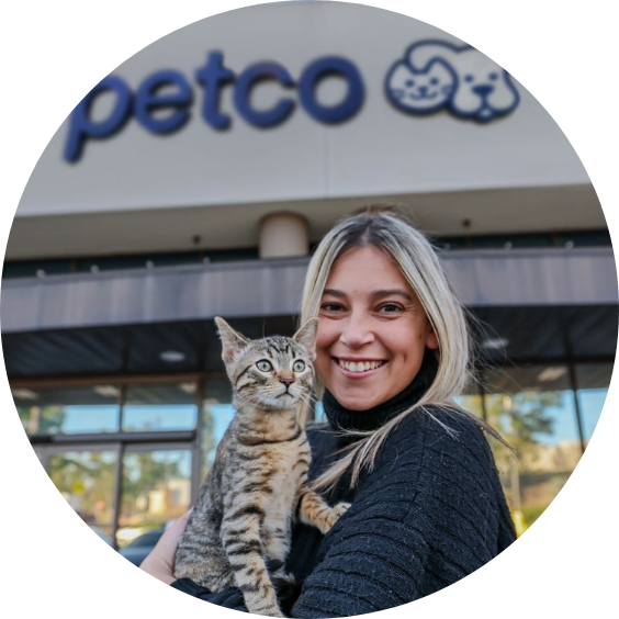 Person holding cat outside Petco store