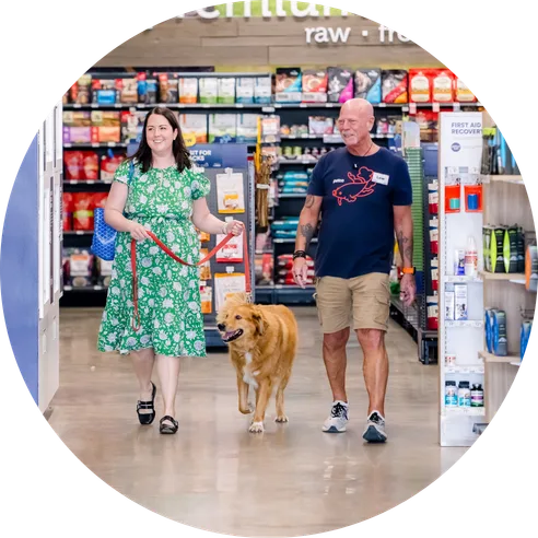 Petco store associate helping a customer