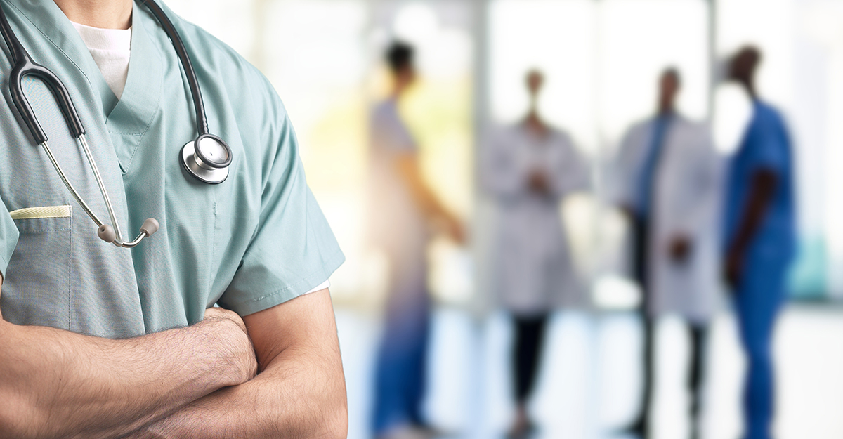 Person wearing scrubs and a stethoscope