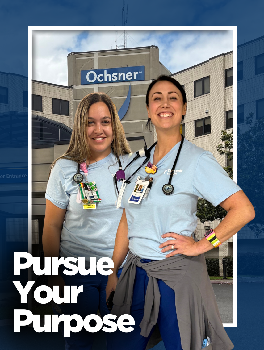 Two smiling nurses from the Med Tele unit at Ochsner Slidell Memorial Hospital stand together in their scrubs. The background features a modern hospital building.