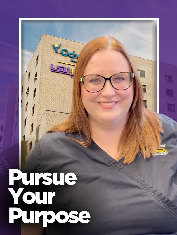 Woman in gray scrubs in front of a hospital