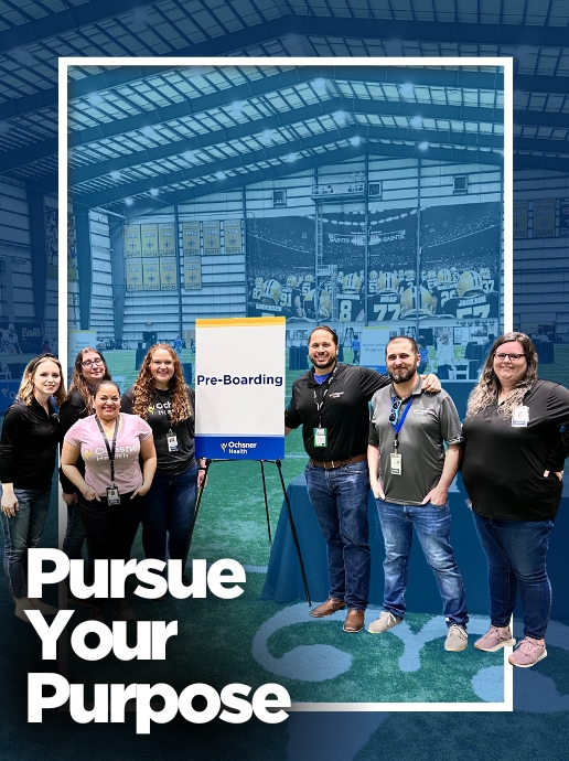 A group of people stand inside an indoor sports facility next to a sign that reads "Pre‑Boarding." Text reads, "Pursue Your Purpose.”