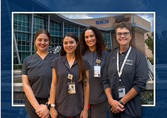 Portrait of an Ochsner radiation therapy team members standing in front of a fountain at the Slidell Regional Cancer Center building.