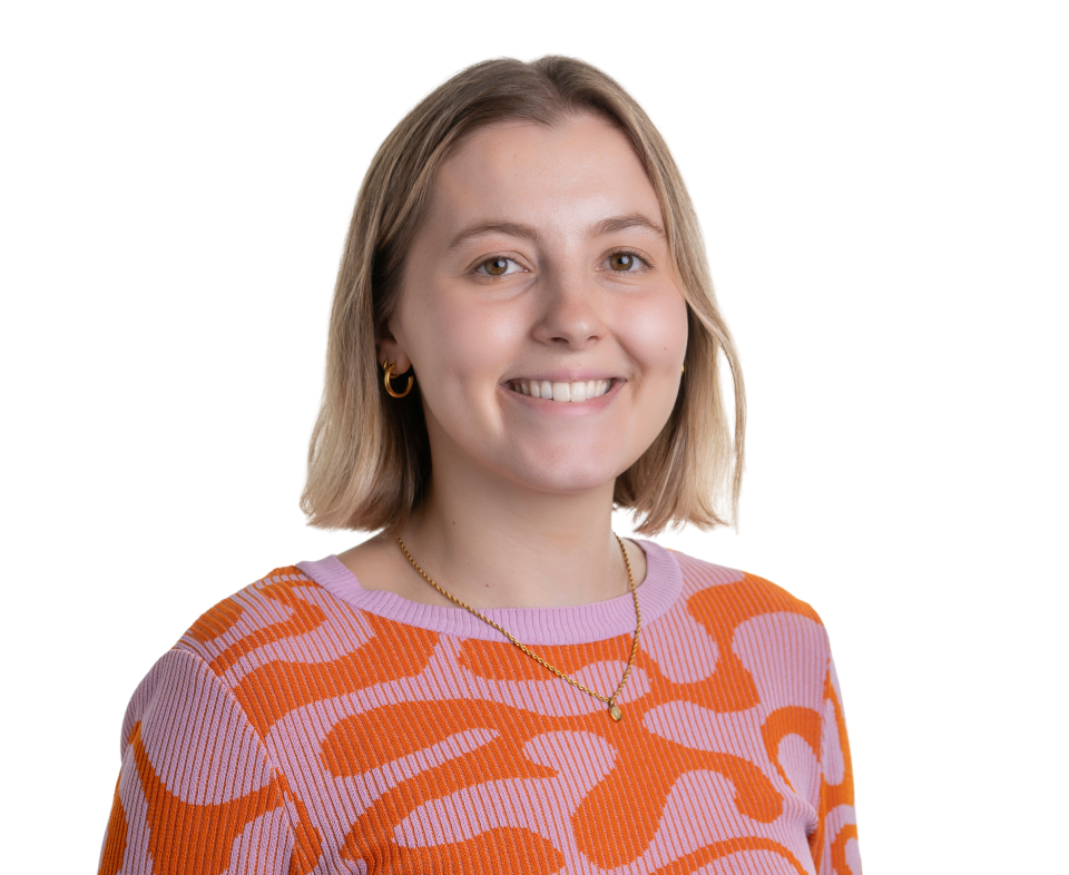 Portrait of a woman in a patterned sweater