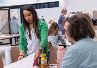 Team collaboration in a workshop setting.