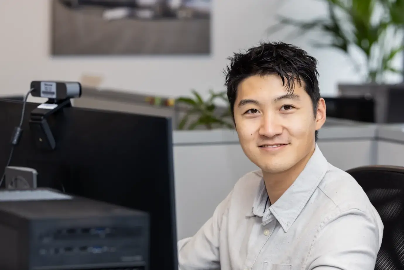 employee sitting at computer