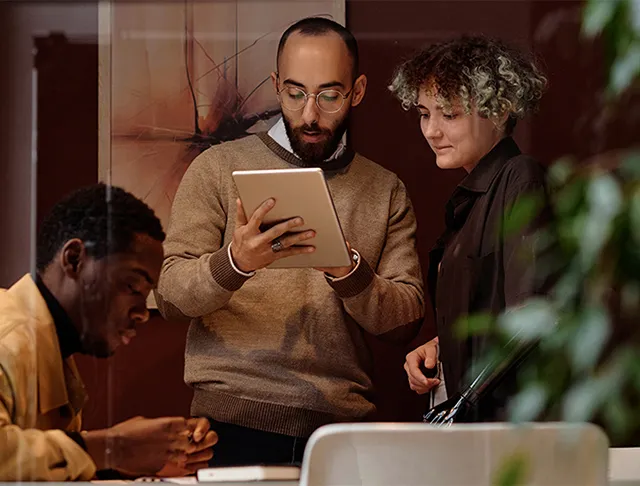 A group of people looking an events