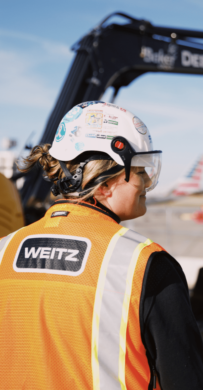 Weitz construction worker in safety gear on job site
