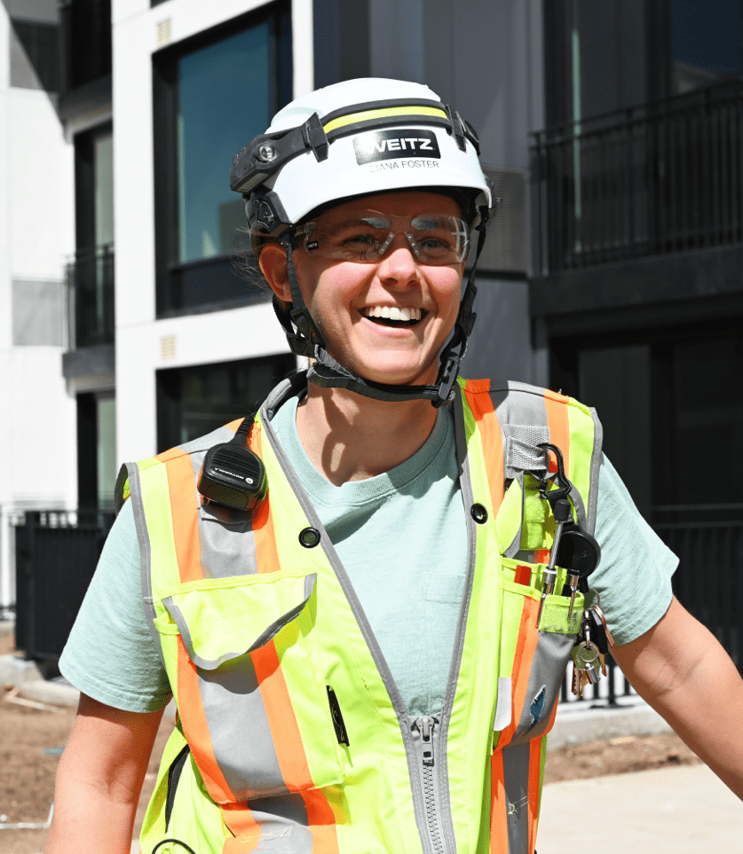 Smiling Girl at Construction Site