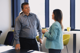 Two peoples having a discussion