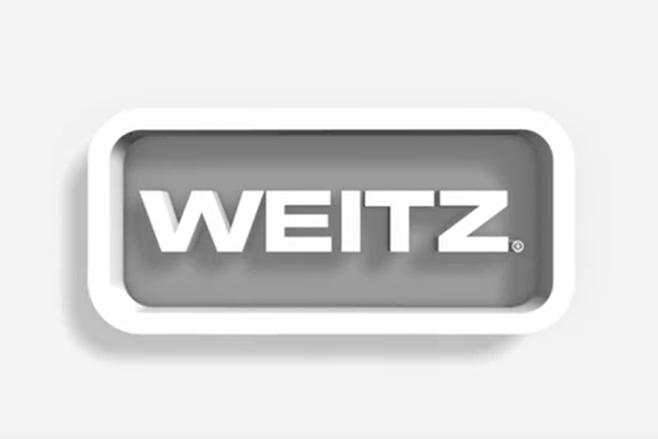 Happy workers in protective equipment representing company culture