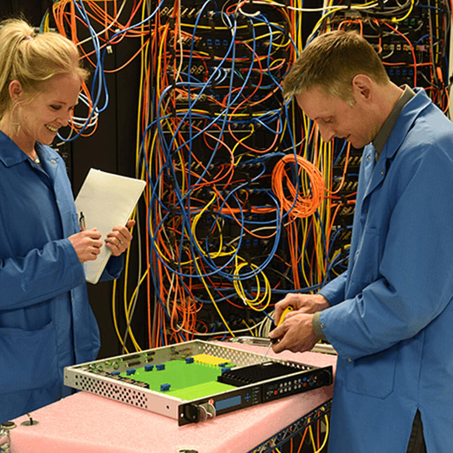 Female and male engineers working on a project