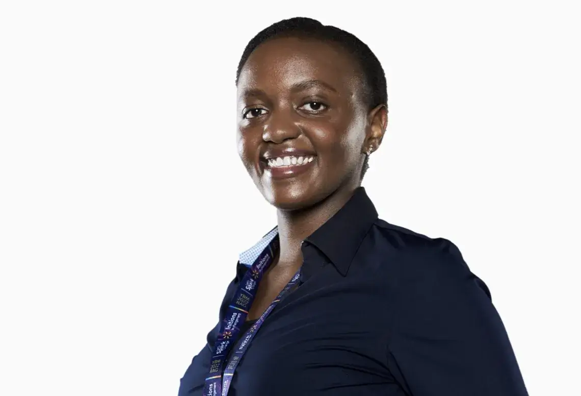 A female Hiring Manager smiling for a picture against a white background