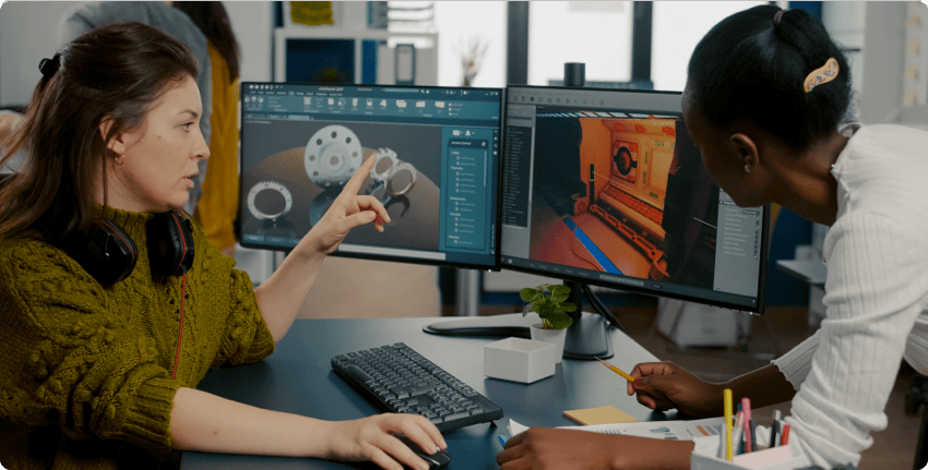 Two people looking at a computer screen