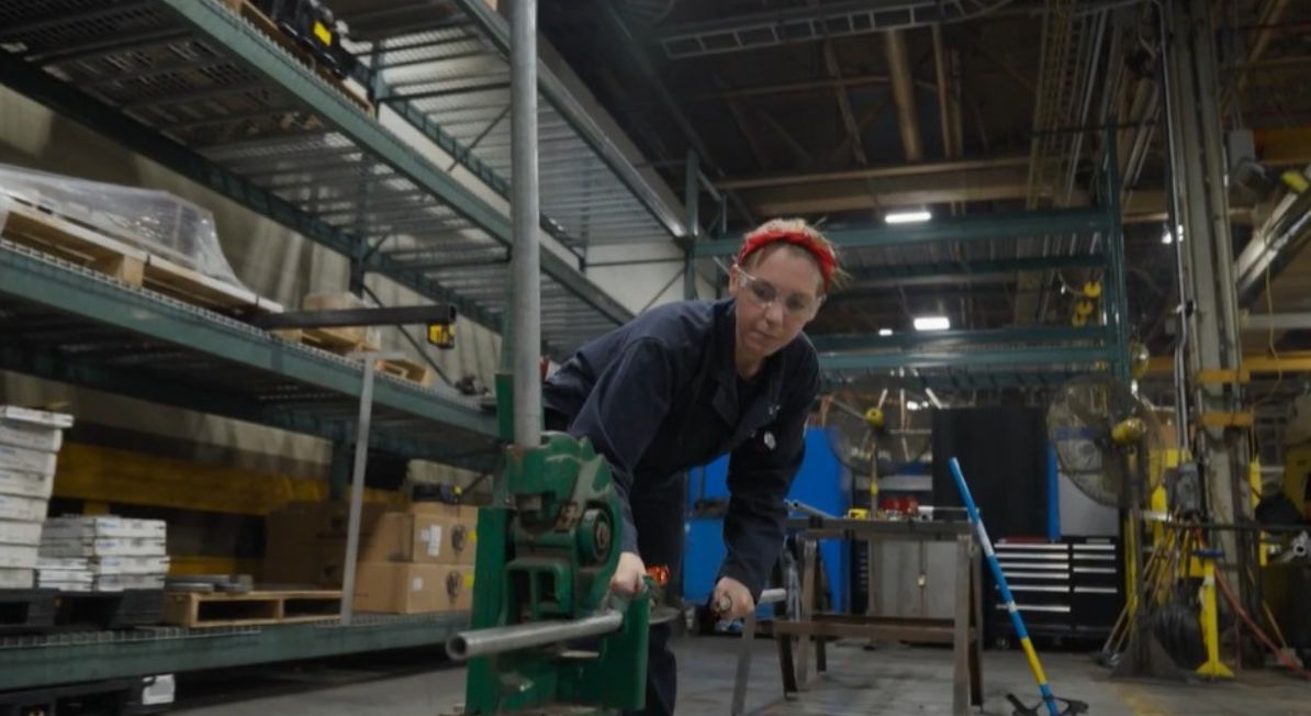 Kansas City Assembly Plant electrician working in the plant