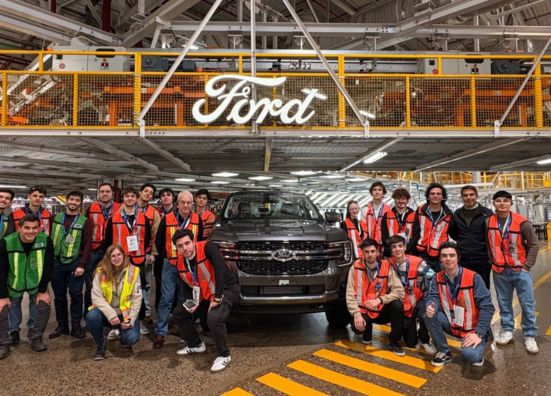 Ford employees posing with an F-150 at the Pacheco Plant in Argentina