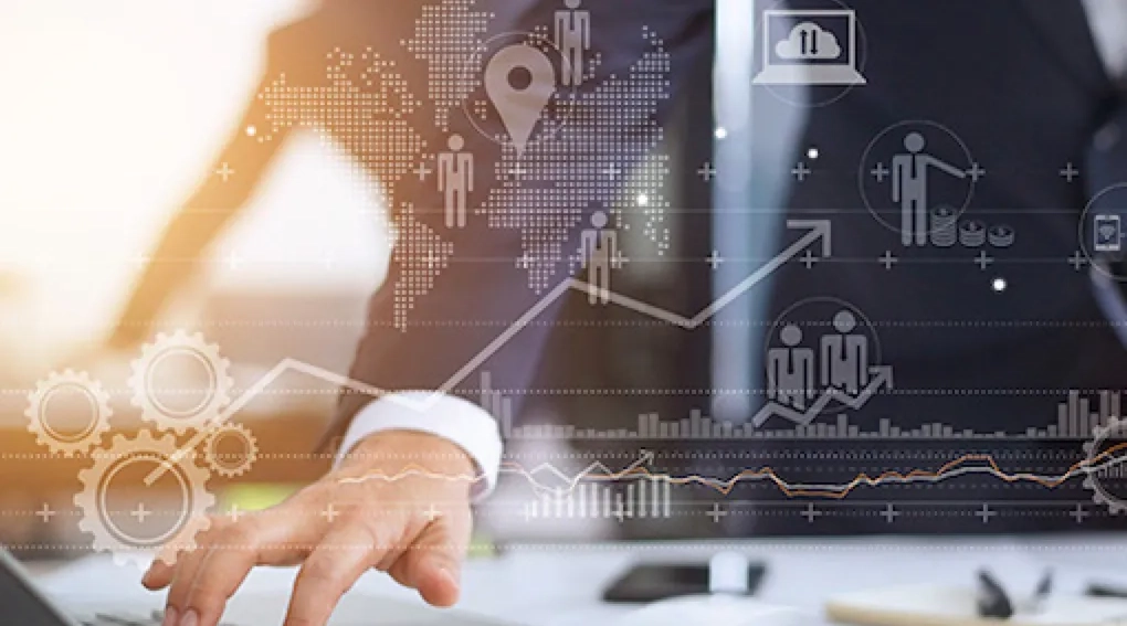 Hand pointing at digital data graphics