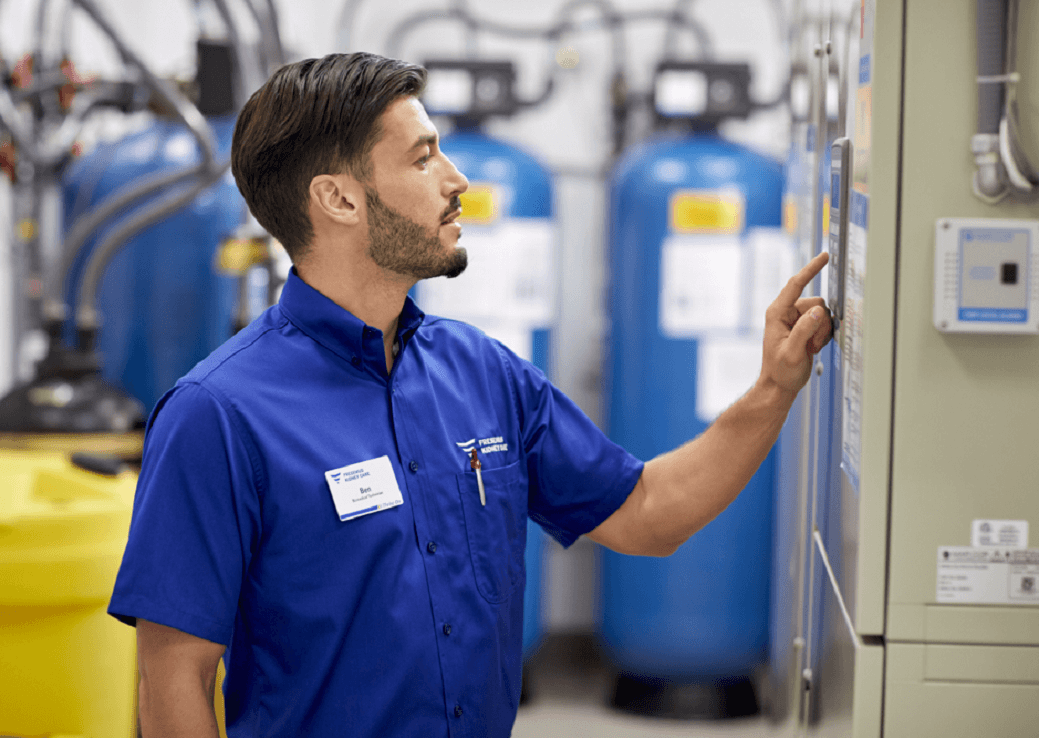 Technician looking at equipment