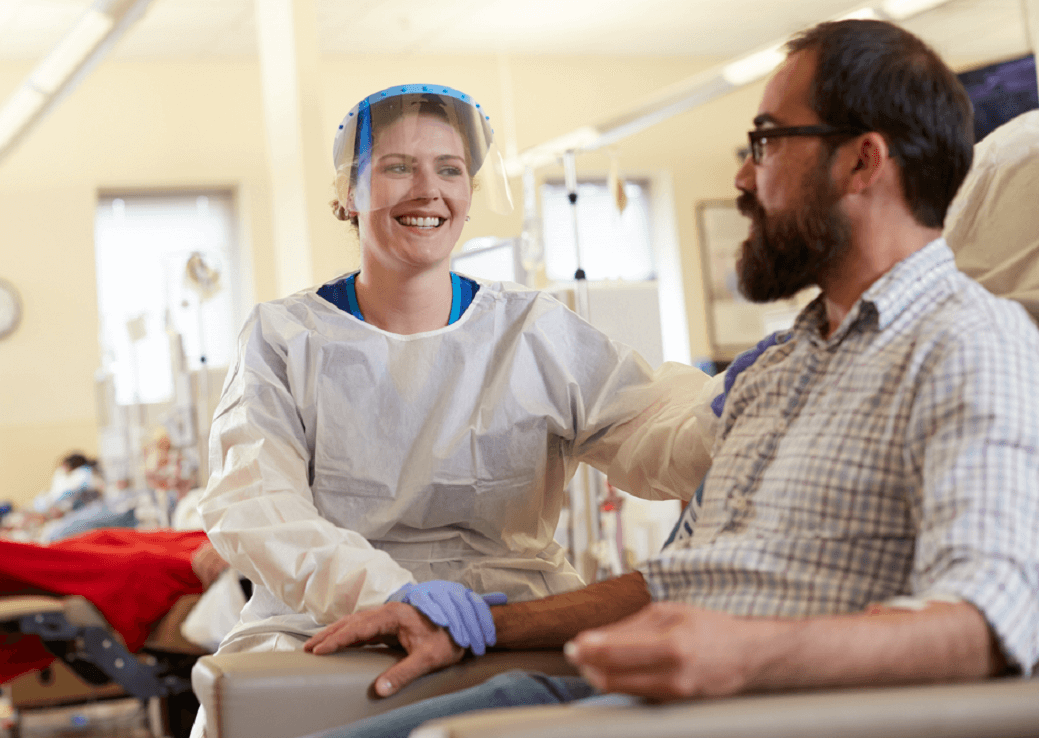 Patient Care Technician smiling with a patient