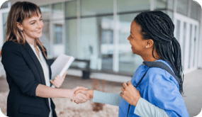 Recruiter shaking the hand of an applicant