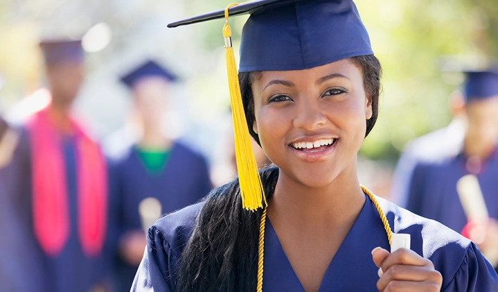a woman in graduation attire