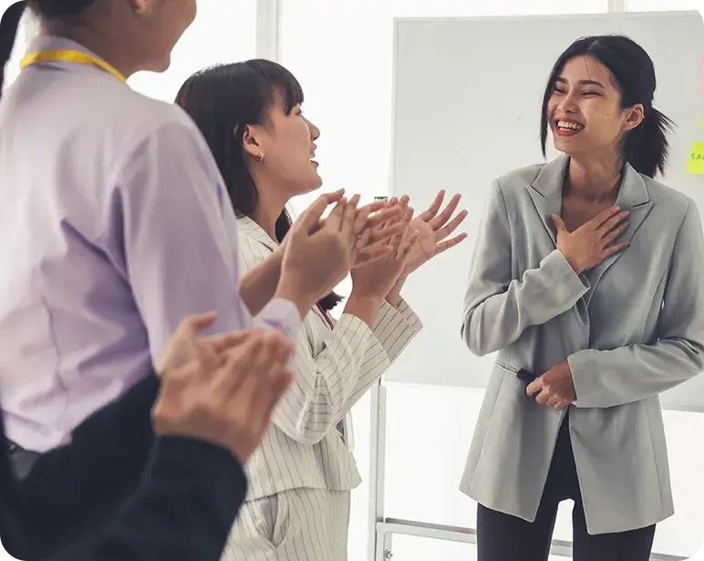woman being congratulated