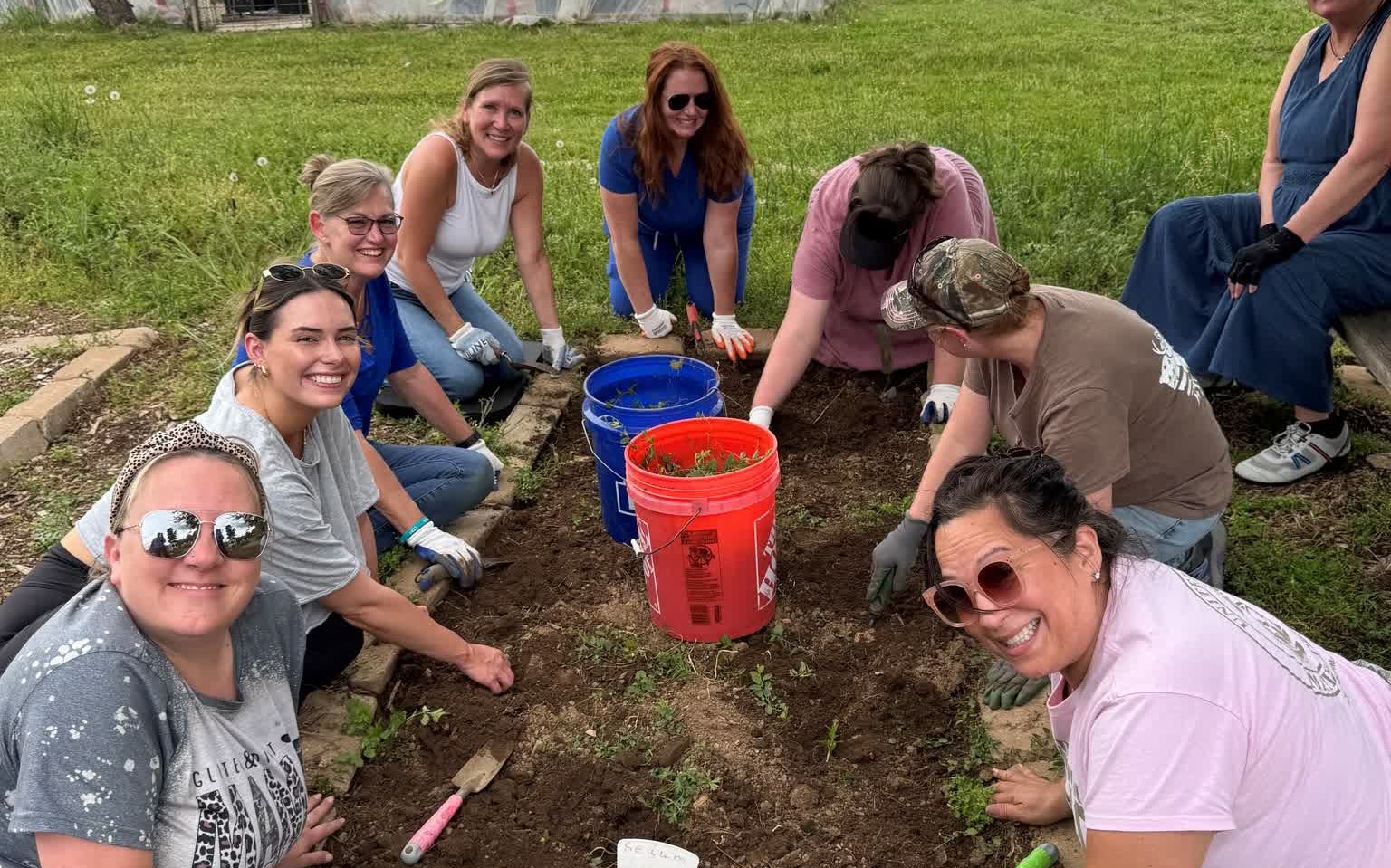 group of people gardening
