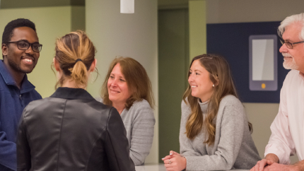 Group of colleagues chatting